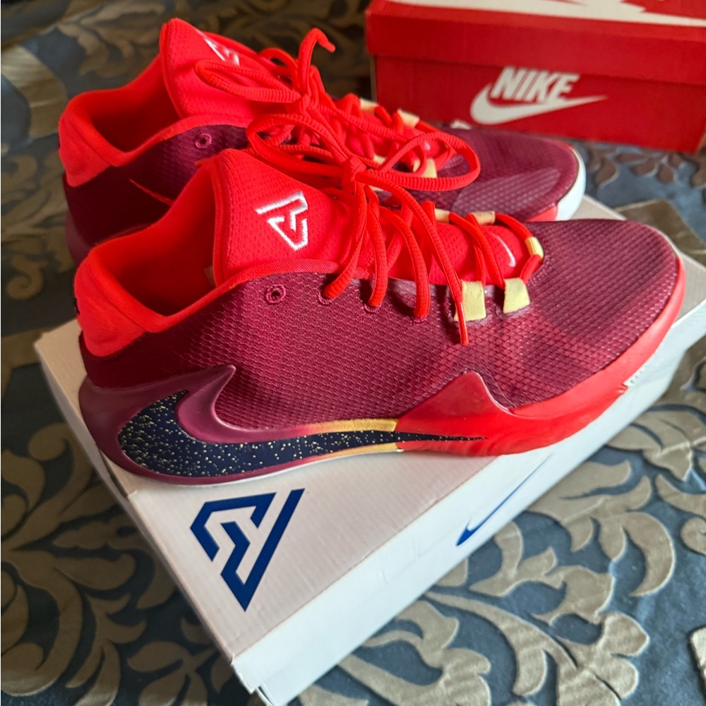 Nike Maroon and Orange  Basketball Shoes. “Greek Freak”.
